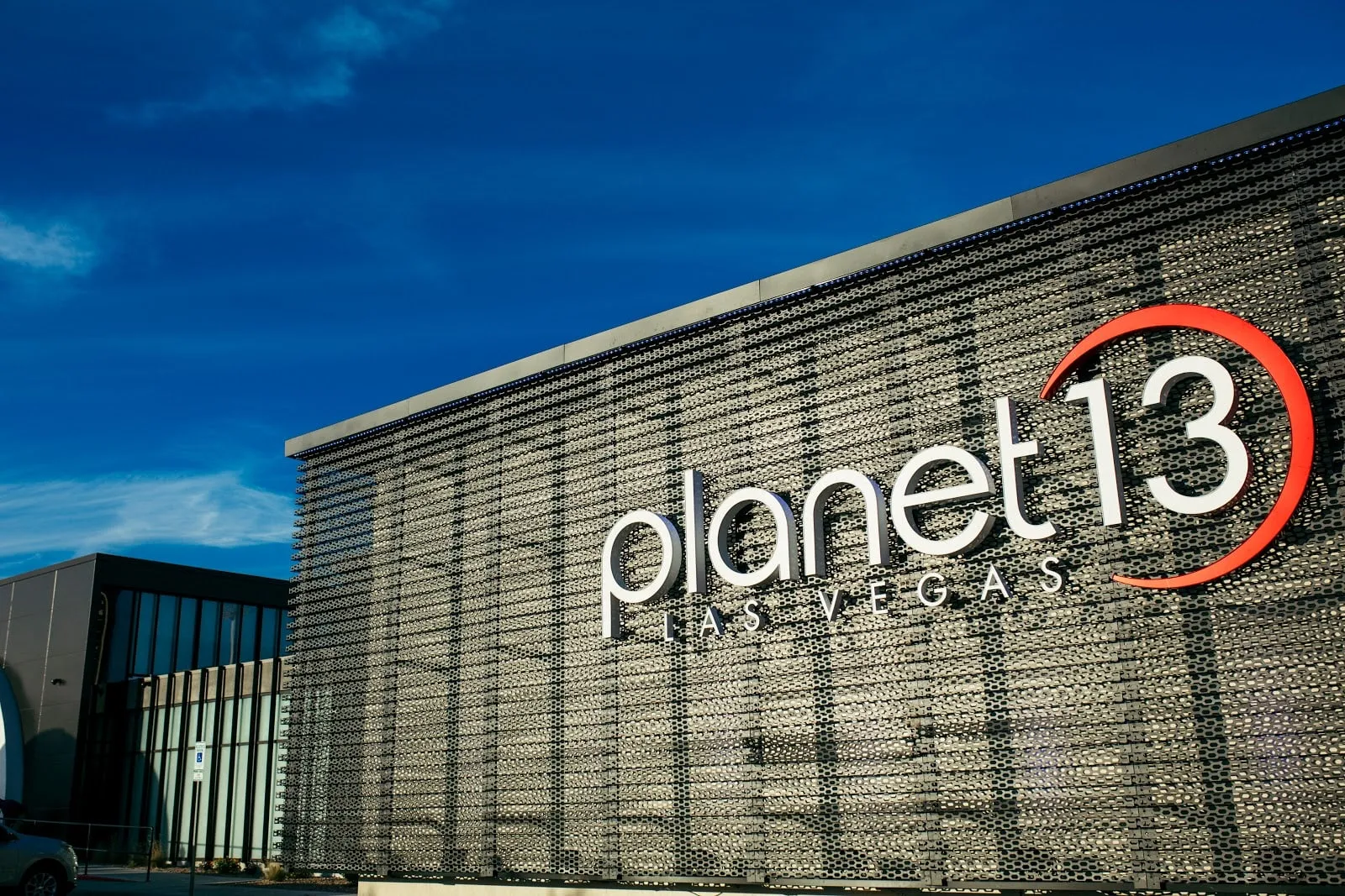 The Planet 13 Las Vegas name across the building