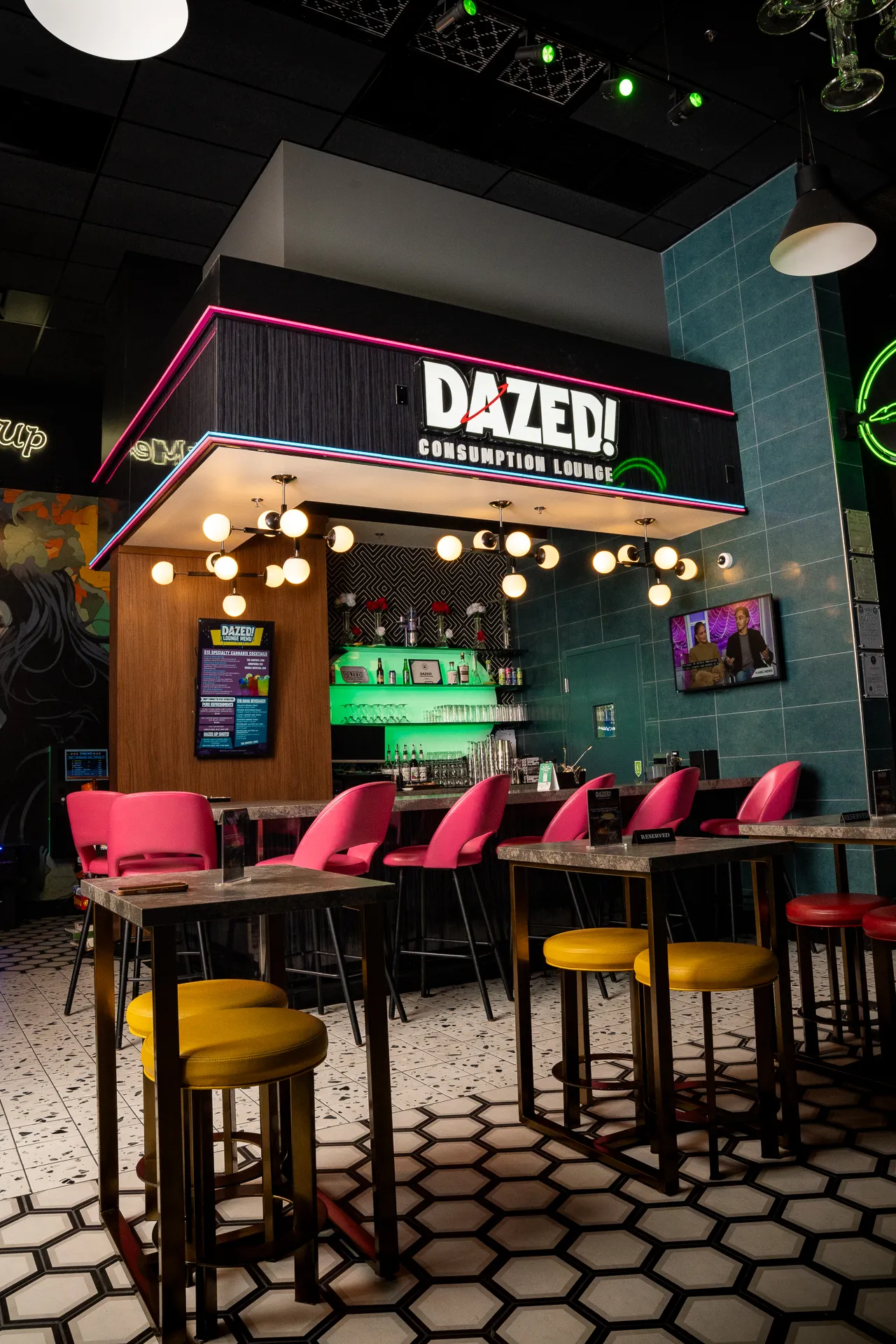 Bar seating at DAZED! under the lounge sign